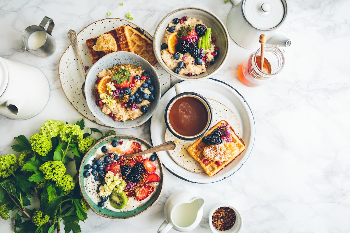 Colorful smoothie bowls with berries and nuts for nutrient-dense breakfasts